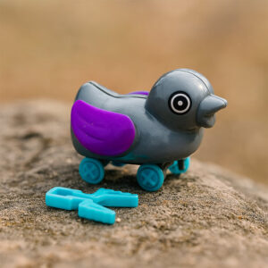 1943.jpg Small push back duck toy, Ejectable spring tail...